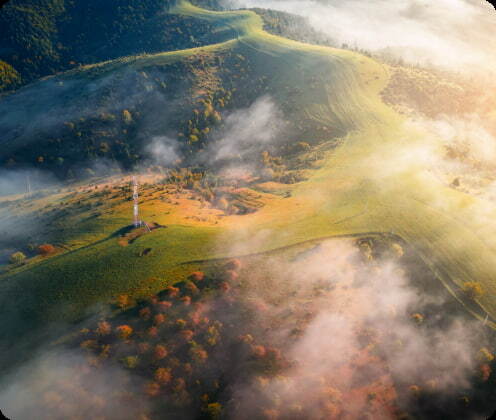 aerial-view-of-green-forests-and-blue-lakes-and-ri-2023-11-27-05-01-19-utc 1